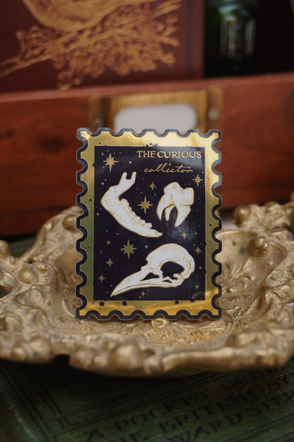 The Curious Collector bones Stamp sticker | Gold Mirror details