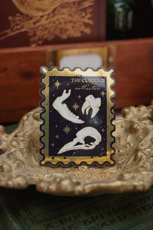 The Curious Collector bones Stamp sticker | Gold Mirror details