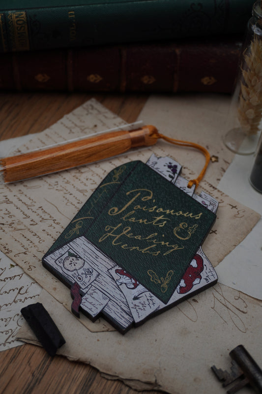 Wooden ornament | Poisonous Plants book